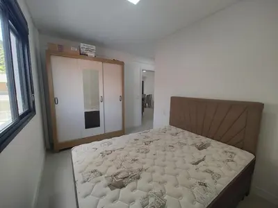 Uma cama ou camas num quarto em Apto 290m da Praia de Palmas - 0327