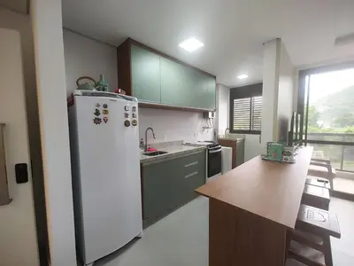 A cozinha ou kitchenette de Apto metros da Praia de Palmas - 0229
