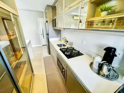 A cozinha ou kitchenette de Apto 100m da Praia de Palmas - 0330