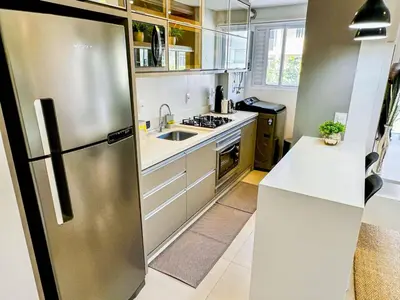 A cozinha ou kitchenette de Apto 100m da Praia de Palmas - 0330