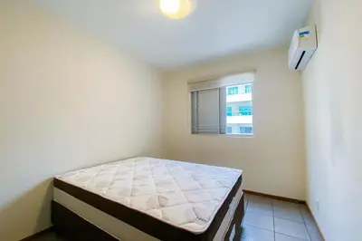 Uma cama ou camas num quarto em Apartamento com vista mar - 0332