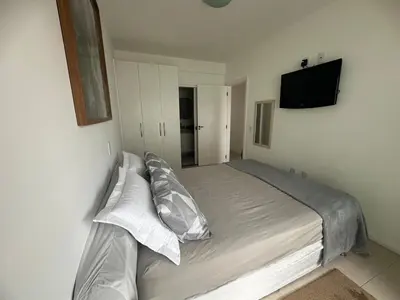 Uma cama ou camas num quarto em Apartamento para férias na Praia de Palmas - 0235