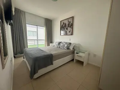Uma cama ou camas num quarto em Apartamento para férias na Praia de Palmas - 0235