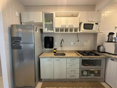 A cozinha ou kitchenette de Apartamento para férias na Praia de Palmas - 0235