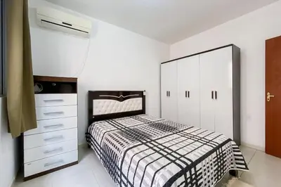 Uma cama ou camas num quarto em Casa na Praia de Palmas - 0238
