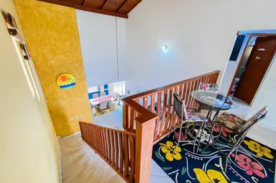 Uma área de estar em Casa na Praia de Palmas - 0238
