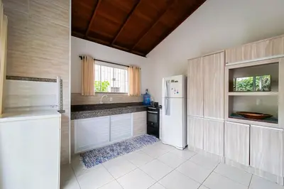 A cozinha ou kitchenette de Casa na Praia de Palmas - 0238