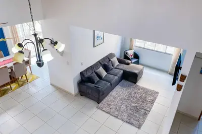 Uma área de estar em Casa na Praia de Palmas - 0238