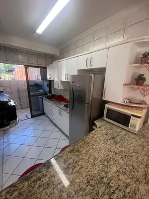 A cozinha ou kitchenette de Sobrado Centro de bombinhas 50 m do mar com 02 suítes