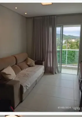 Uma cama ou camas num quarto em Aconchegante Apartamento na praia de Palmas, 2 quartos
