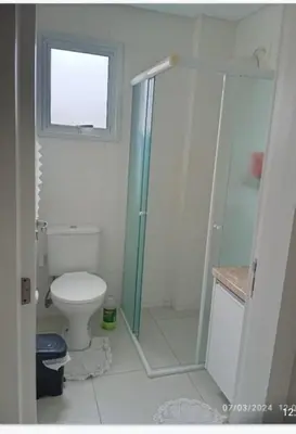 Uma casa de banho em Aconchegante Apartamento na praia de Palmas, 2 quartos