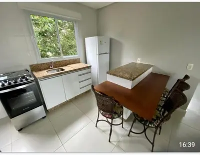 A cozinha ou kitchenette de Aconchegante Apartamento na praia de Palmas, 2 quartos