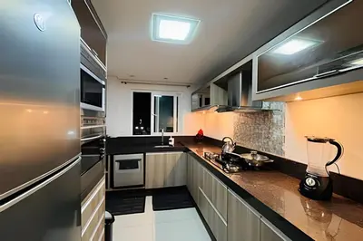 A cozinha ou kitchenette de Belleville 2 Suítes Praia & Aquarium |CURTA190