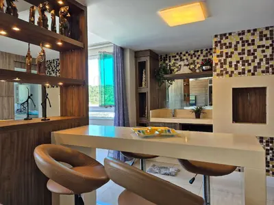 A cozinha ou kitchenette de Belleville 2 Suítes Praia & Aquarium |CURTA190