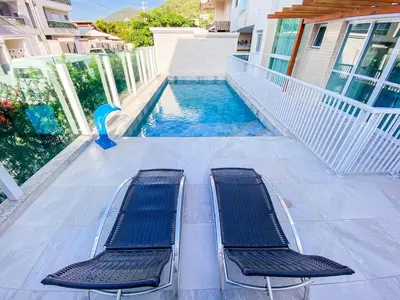 A piscina em ou perto de Conforto a 450m da Praia de Palmas - 0101