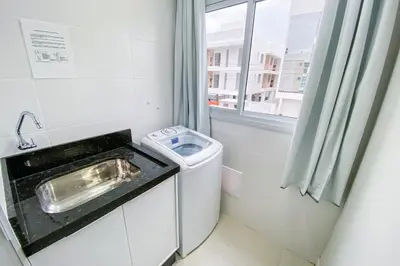 A cozinha ou kitchenette de Descanso e conforto a 450m da Praia de Palmas 0102