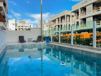 A piscina em ou perto de Descanso e conforto a 450m da Praia de Palmas 0102