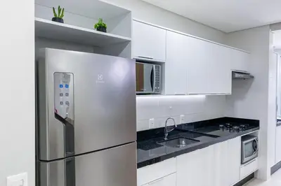 A cozinha ou kitchenette de Descanso e conforto a 450m da Praia de Palmas 0102