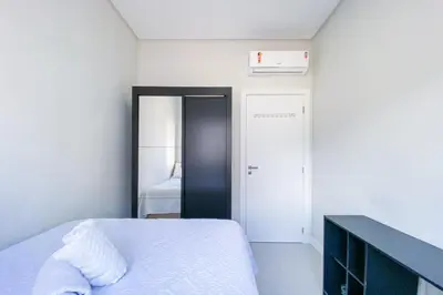 Uma cama ou camas num quarto em Apto no paraíso, conheça praia de Palmas - 0115
