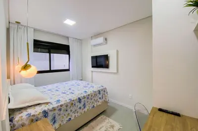 Uma cama ou camas num quarto em Apto Charmoso com 2 Quartos sendo 1 Suíte - 0403