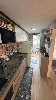 A cozinha ou kitchenette de Apartamento Vista Mar - Área de Lazer - Poucos Minutos do Mar