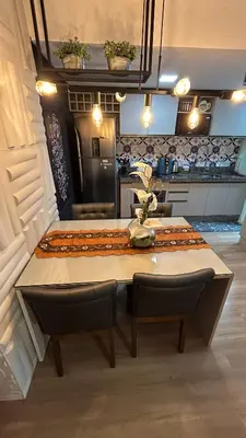 A cozinha ou kitchenette de Apartamento Vista Mar - Área de Lazer - Poucos Minutos do Mar
