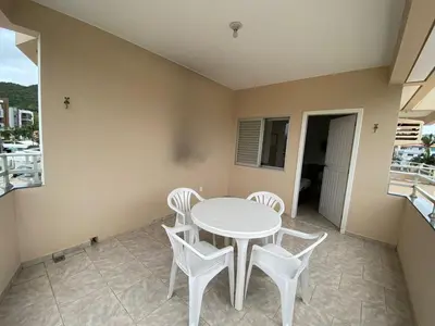Uma varanda ou terraço em Praia de Palmas Loft a 150m da Praia - 0411