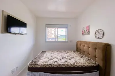 Uma cama ou camas num quarto em Apto em condomínio completo em Palmas - 0418