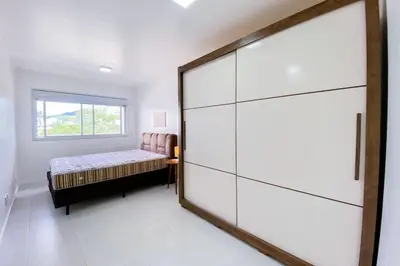 Uma cama ou camas num quarto em Apto em condomínio completo em Palmas - 0418