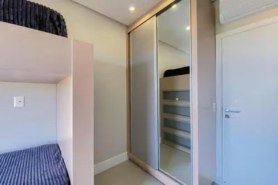 Uma cama ou camas num quarto em Apartamento luxo com vista mar - 0419
