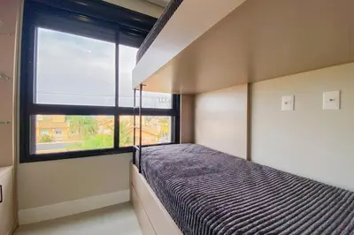 Uma cama ou camas num quarto em Apartamento luxo com vista mar - 0419