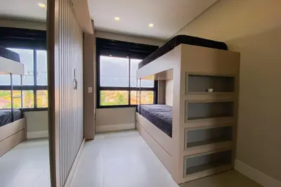 Uma cama ou camas num quarto em Apartamento luxo com vista mar - 0419