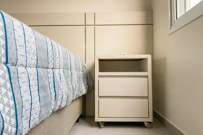 Uma cama ou camas num quarto em Apartamento novo em residencial com piscina - 0420