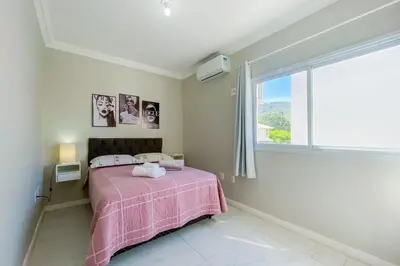 Uma cama ou camas num quarto em Praia de Palmas 400m do Mar, 02 quartos - 0421