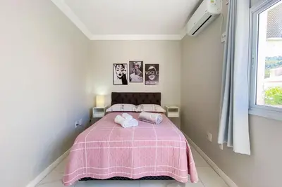 Uma cama ou camas num quarto em Praia de Palmas 400m do Mar, 02 quartos - 0421
