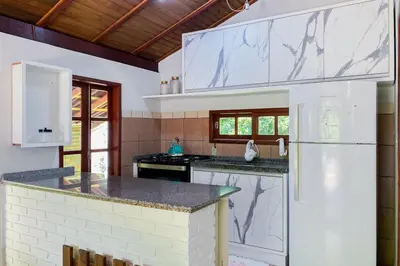 A cozinha ou kitchenette de Casa há 200 metros do Mar em Condomínio - 0422