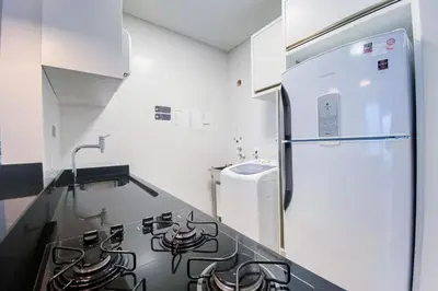 A cozinha ou kitchenette de Apto confortável há poucos metros da praia - 0423