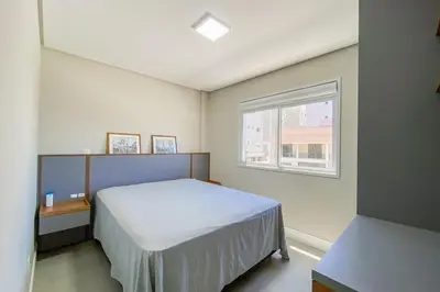 Uma cama ou camas num quarto em Apto novo há poucos metros do mar em Palmas - 0424
