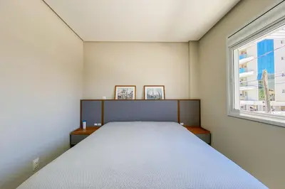 Uma cama ou camas num quarto em Apto novo há poucos metros do mar em Palmas - 0424