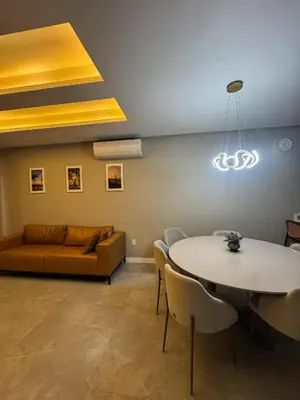 Uma área de estar em Triplex 3850 - Suítes