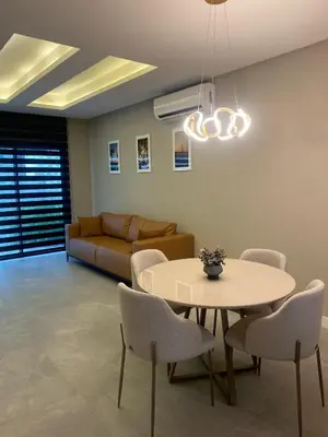 Uma área de estar em Triplex 3850 - Suítes