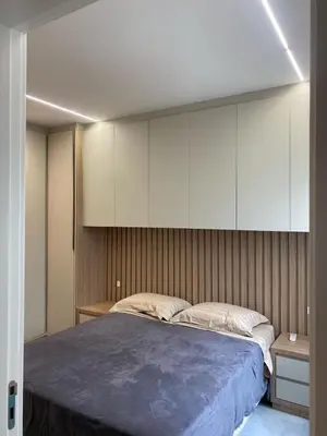 Uma cama ou camas num quarto em Triplex 3850 - Suítes