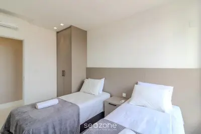 Uma cama ou camas num quarto em Apto c/ Churrasqueira a 250m da Praia MTR1703