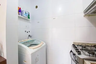 A cozinha ou kitchenette de Apartamento 450m do Mar, Piscina e Conforto - 0435
