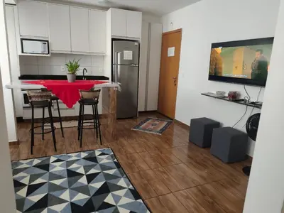 A cozinha ou kitchenette de Apt confortável