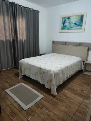 Uma cama ou camas num quarto em Apt confortável