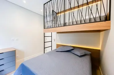 Uma cama ou camas num quarto em Há 250 metros do mar, com 02 quartos na praia - 0440