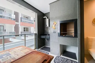 Uma cama ou camas num quarto em Há 250 metros do mar, com 02 quartos na praia - 0440