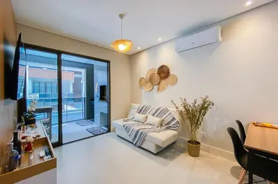 Uma área de estar em Há 250 metros do mar, com 02 quartos na praia - 0440