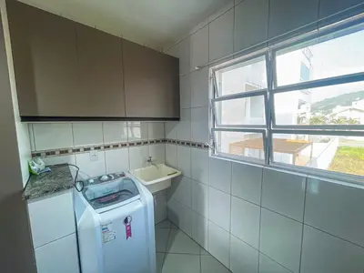 A cozinha ou kitchenette de Amplo apartamento em residencial com piscina - 0455